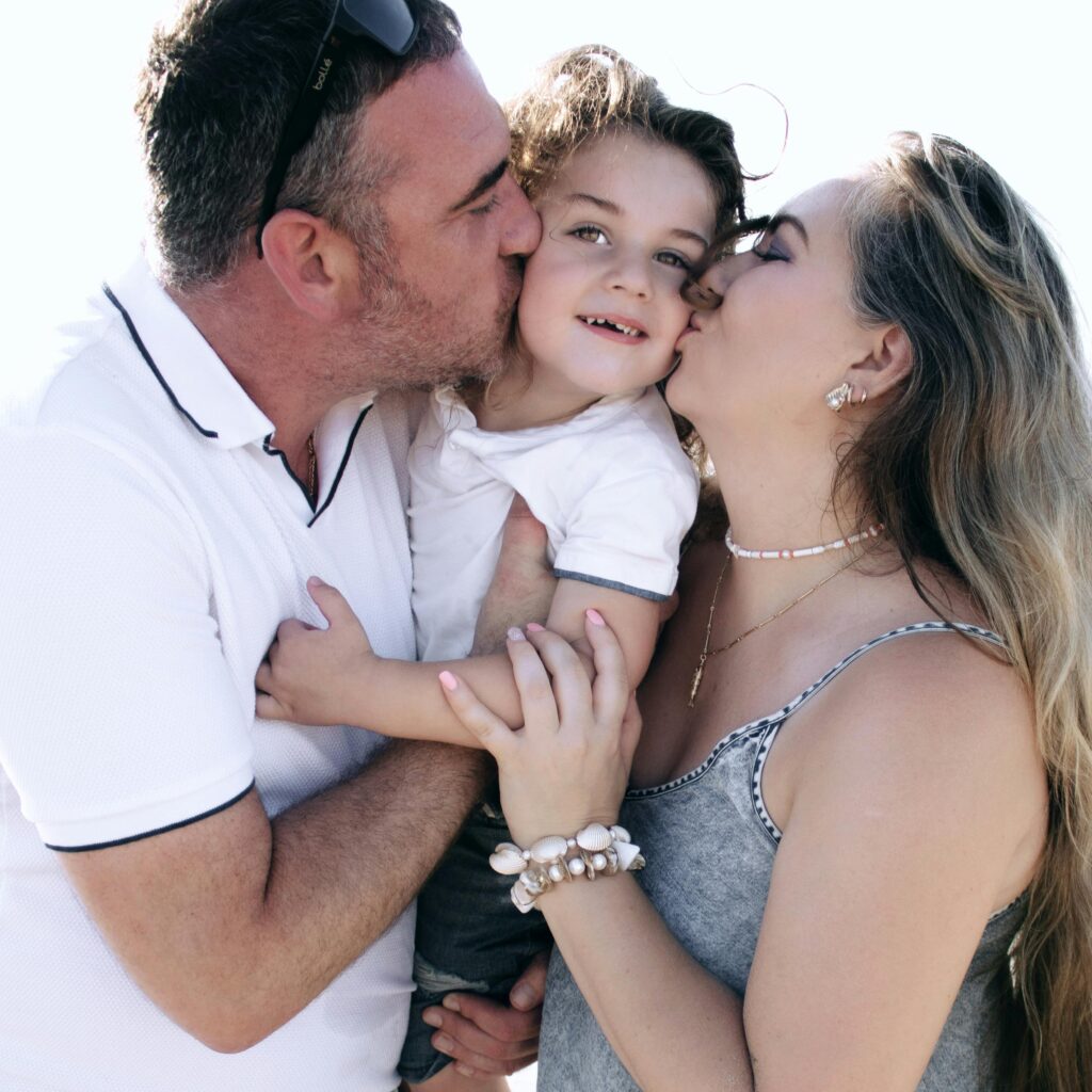 Family sharing a joyful moment outdoors, perfect for lifestyle imagery.